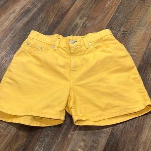 Vintage Levi yellow shorts with blue accents women shorts,great used condition.